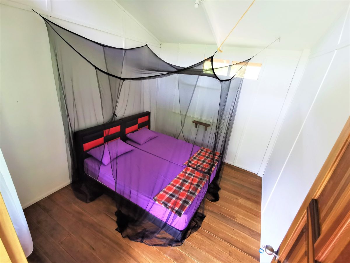 Habitación deluxe con baño compartido